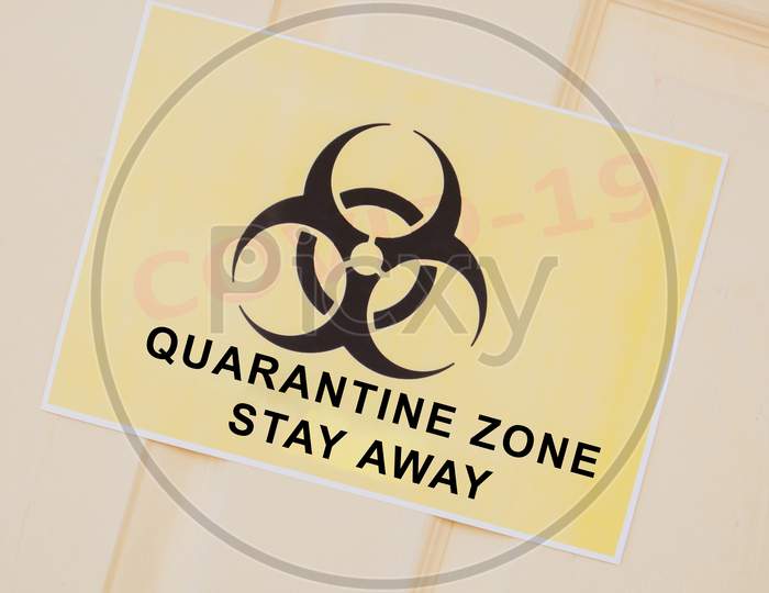 Quarantine Zone Stay Away Board on a Door
