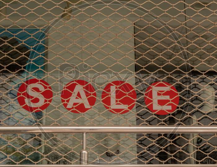 Window Display With Red Sale Board Inside The Shop At Bengaluru, India