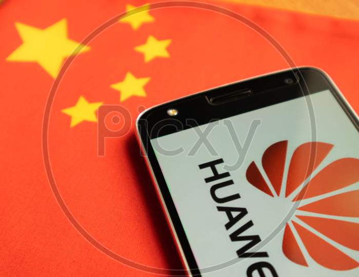 Bangalore, India, June 4, 2019 : Huawei Logo In Mobile On Chinese Flag.
