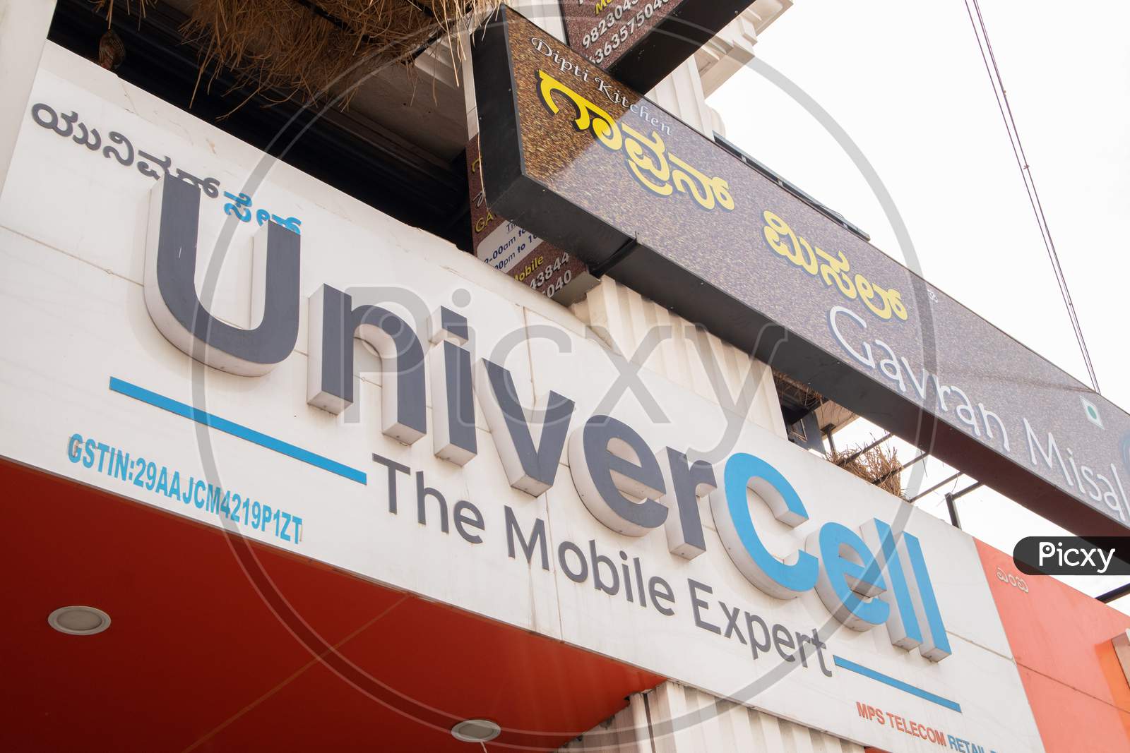 Bengaluru, India June 27,2019 : Front View Bill Board Of Univercell Mobiles At Bengaluru.
