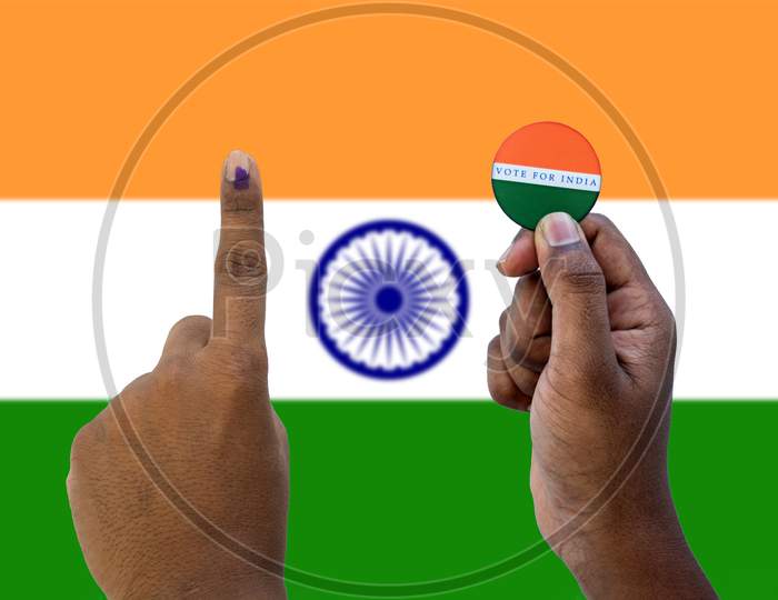 Concept Of Indian Election,Holding Sticker Of Vote For Better Indian On Indian Flag As A Background.