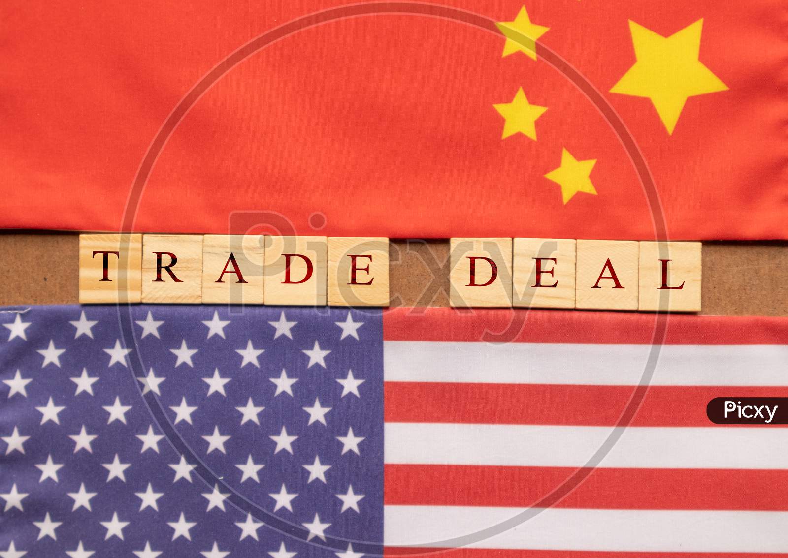 Concept Of China Us Trade Deal, Trade Deal Printed On Wooden Block Letters In Between China And Us Flags.