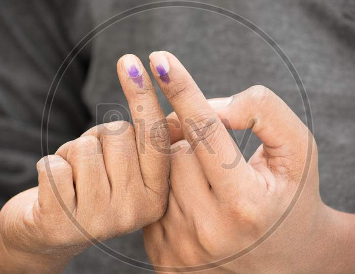 Indian Voter Showing Voting Sign After The Polling