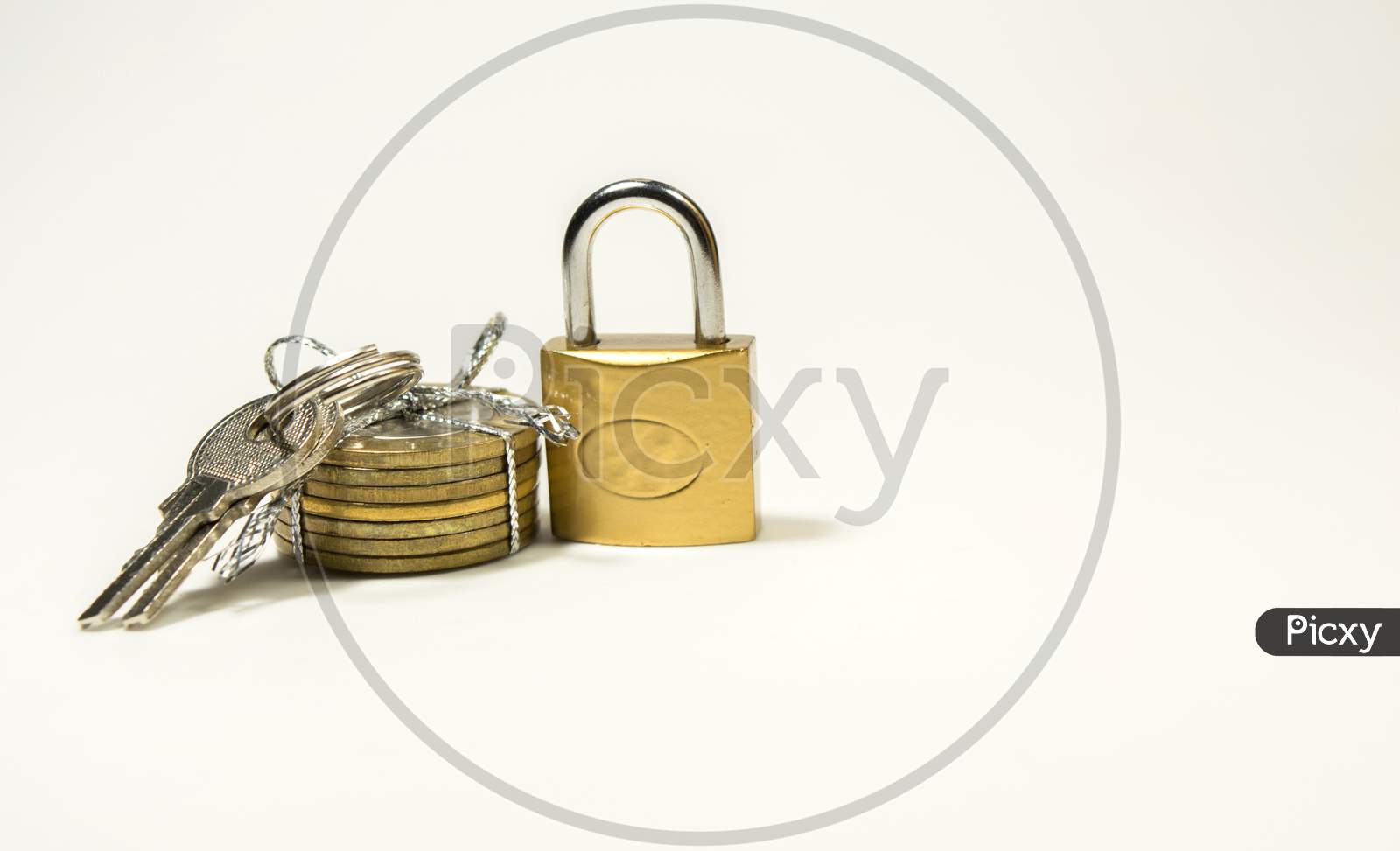 Indian 10 Rupee Coins Tied And Pad Locker With Keys On Isolated White Ackground