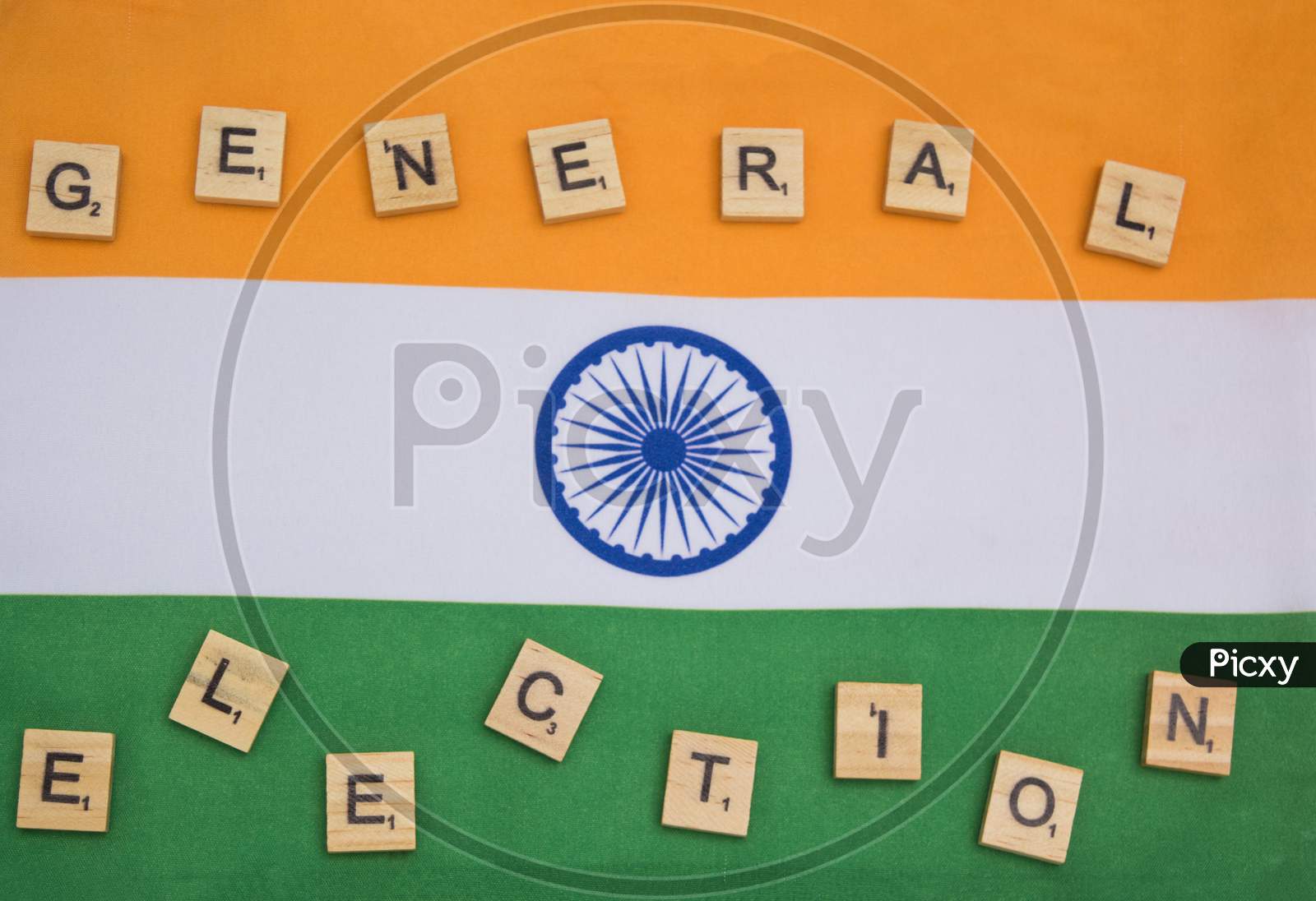 Concept Of Indain General Elections In Wooden Letters On Indian Flag.