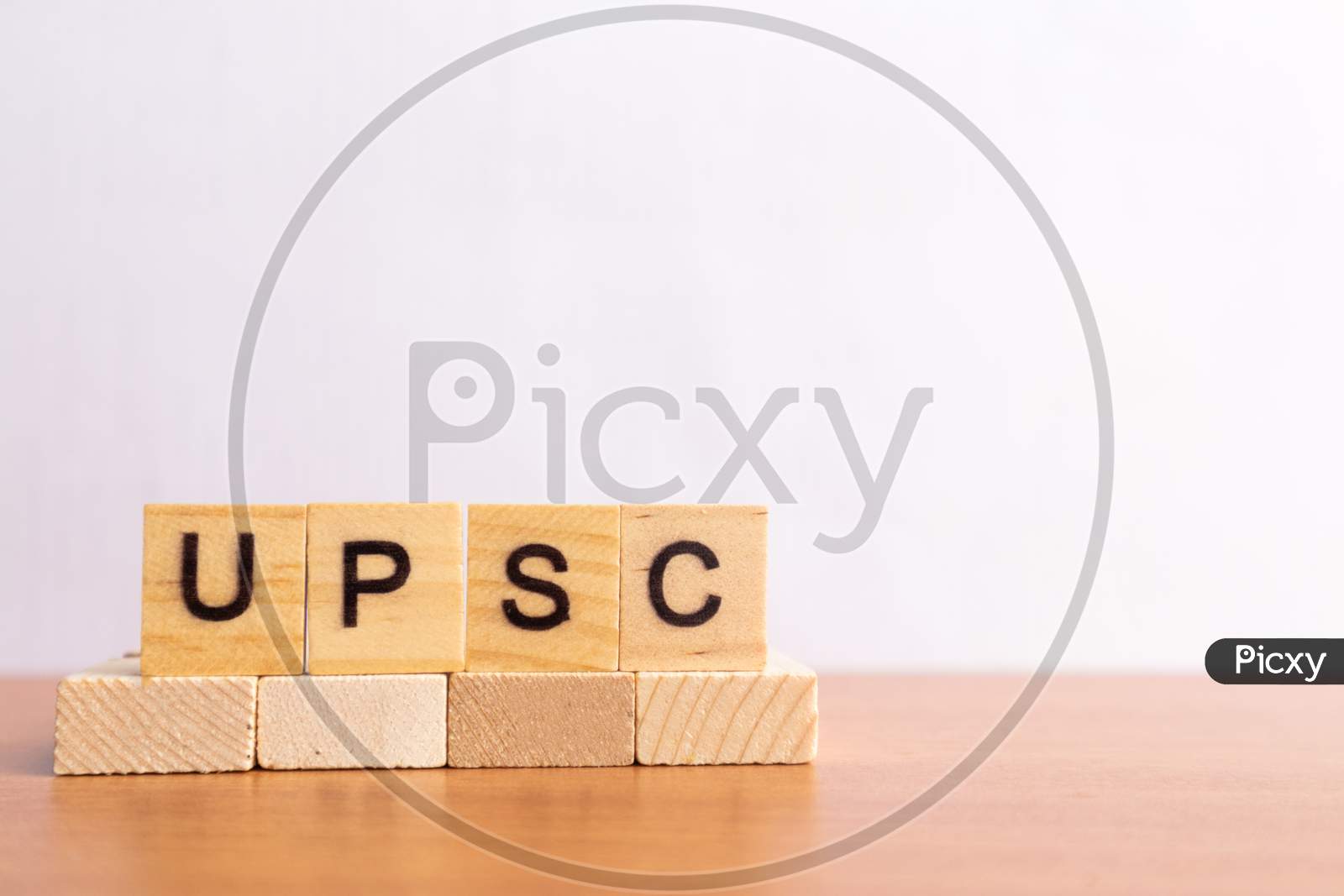 Upsc Or Union Public Service Commission In Wooden Block Letters On Isolated Background