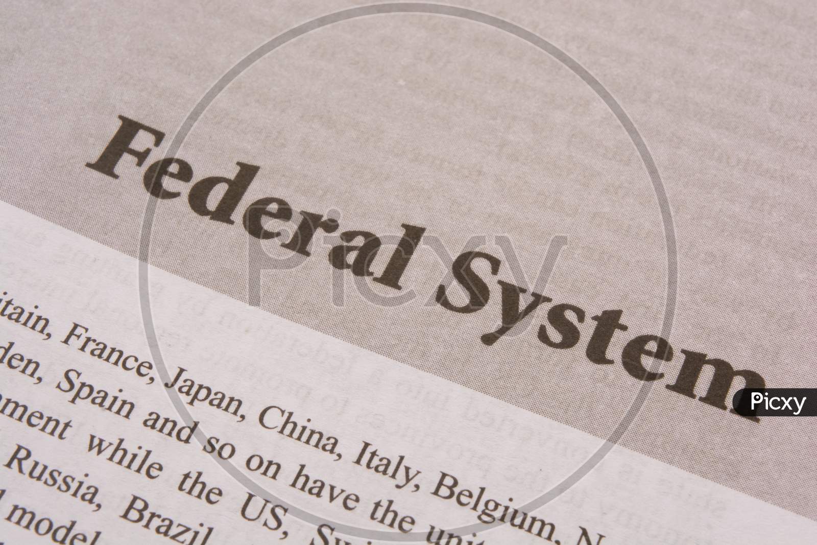 Concept Of Federal System Printed On Paper.