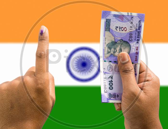 Hand Holding Money And Vote A Concept Of Political Corruption The Purchase Of Votes In Elections On Isolated Background.