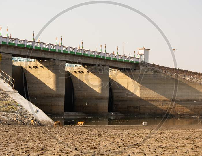 A Dried Up Empty Reservoir Or Dam During A Summer Heatwave, Low Rainfall And Drought In North Karnataka,India