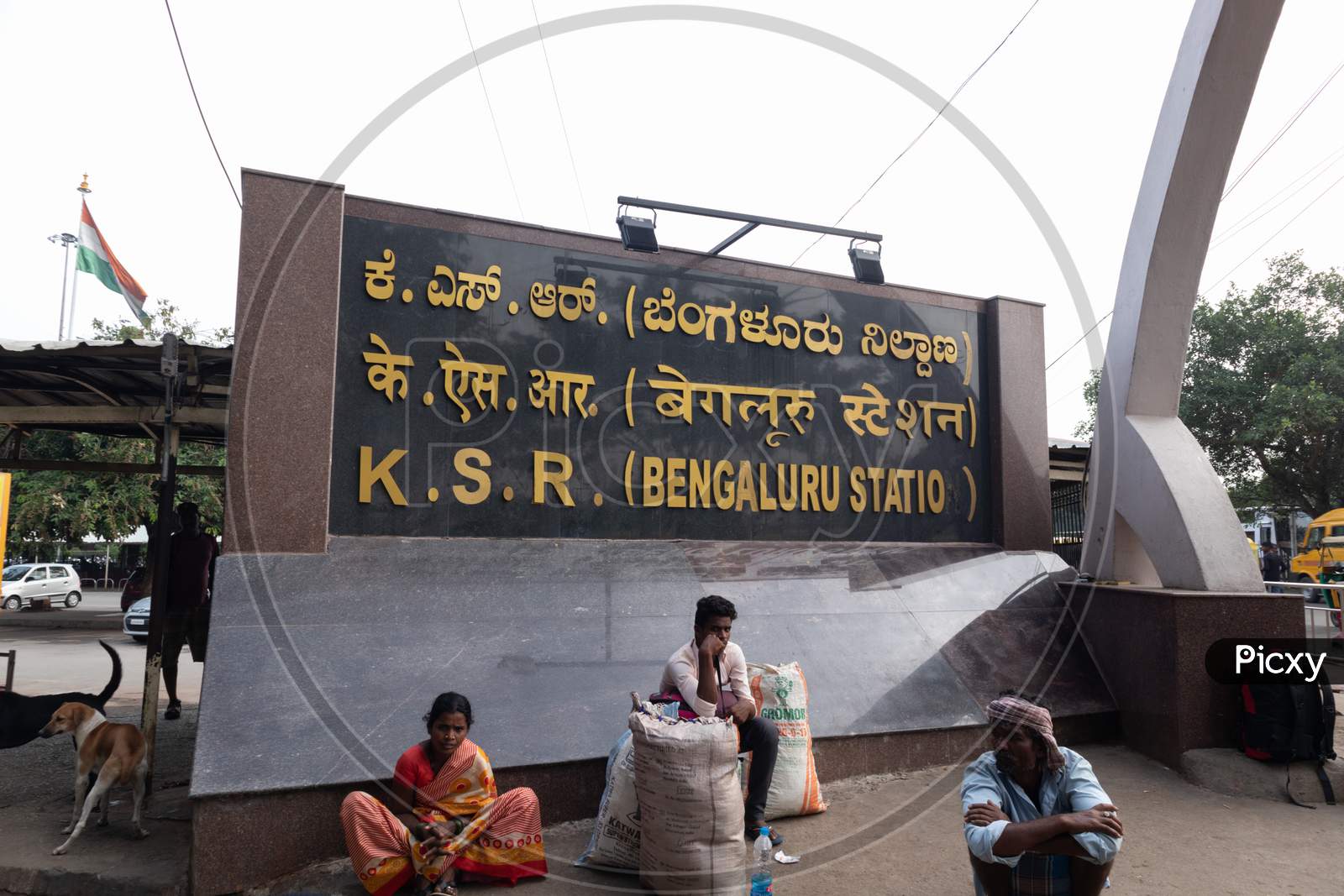 Bengaluru, India - June 03,2019 : Unidentified People Sat Out The Bengalore Railway Station Waiting For Bus.