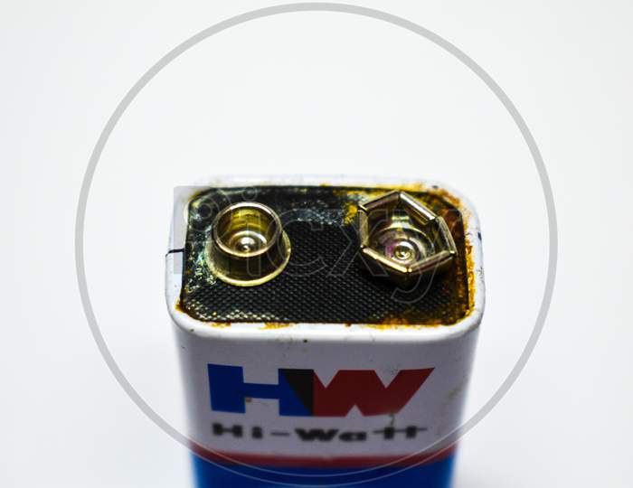 07/06/2020- Kerala,India: Close-Up Of An Old Leaked 9V Dry Cell Battery Of Hw Brand On White Background. Selective Focus Applied.