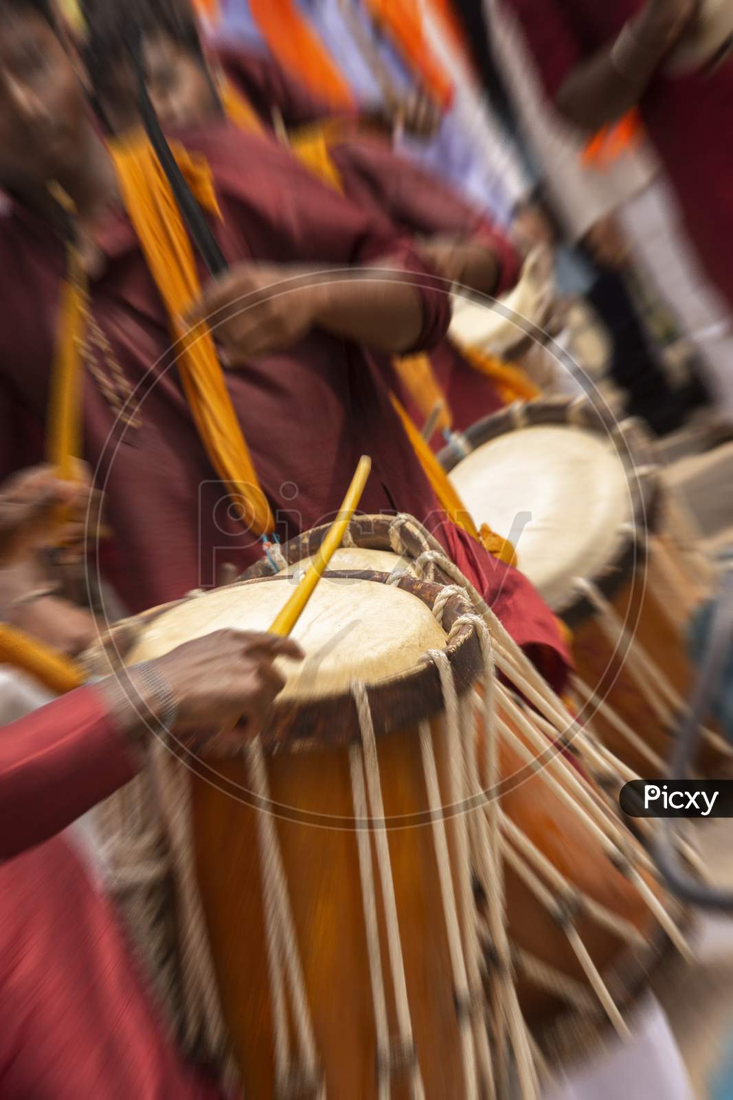 Close up shot of a People playing Drum Music Equipment with Hand