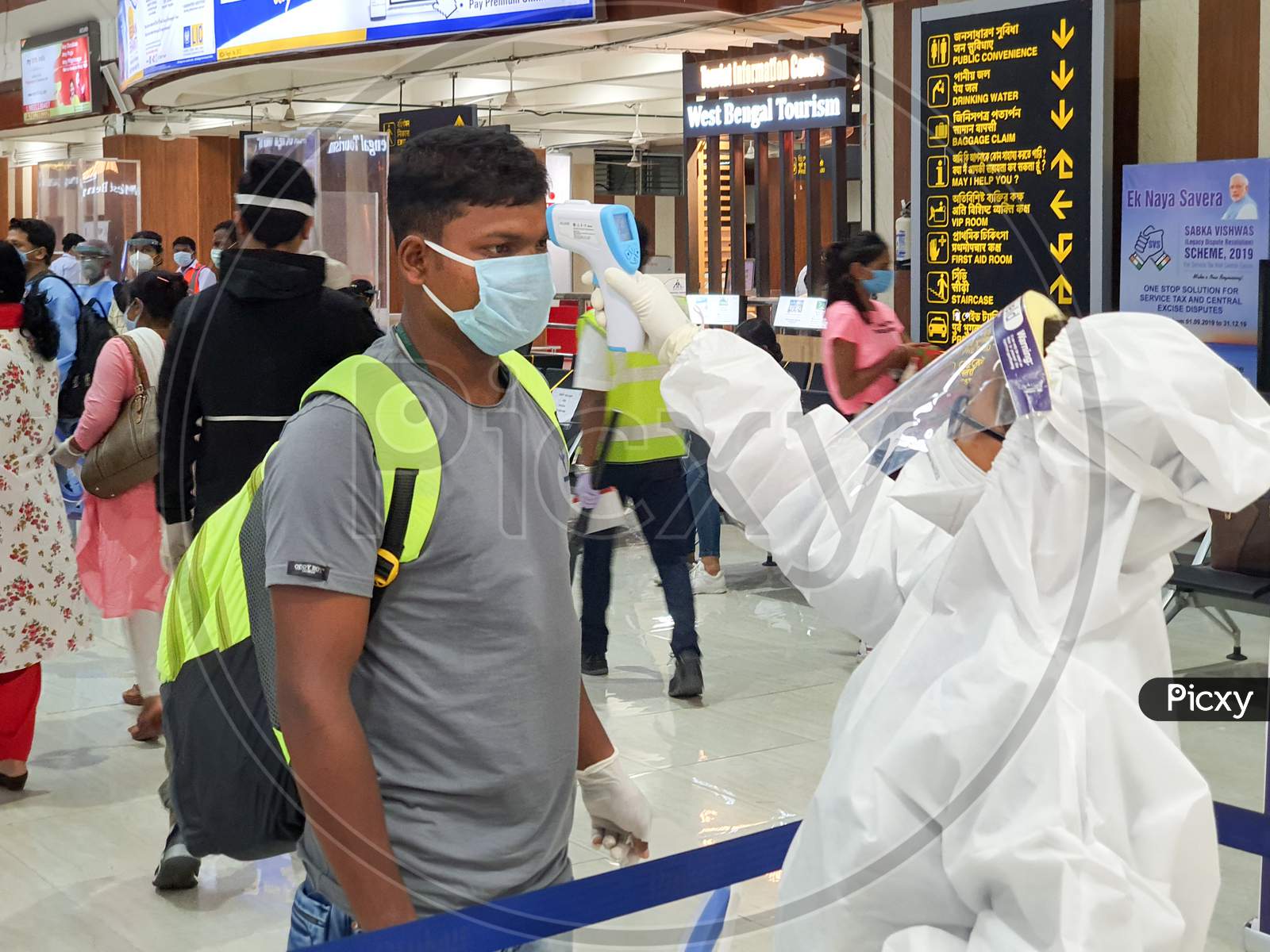 6Th June 2020- Bagdogra Airport,Siliguri, West Bengal, India-Passengers In Protective Gear Being Thermal Scanned For Covid Screening By Airport Crew At Bagdogra Airport