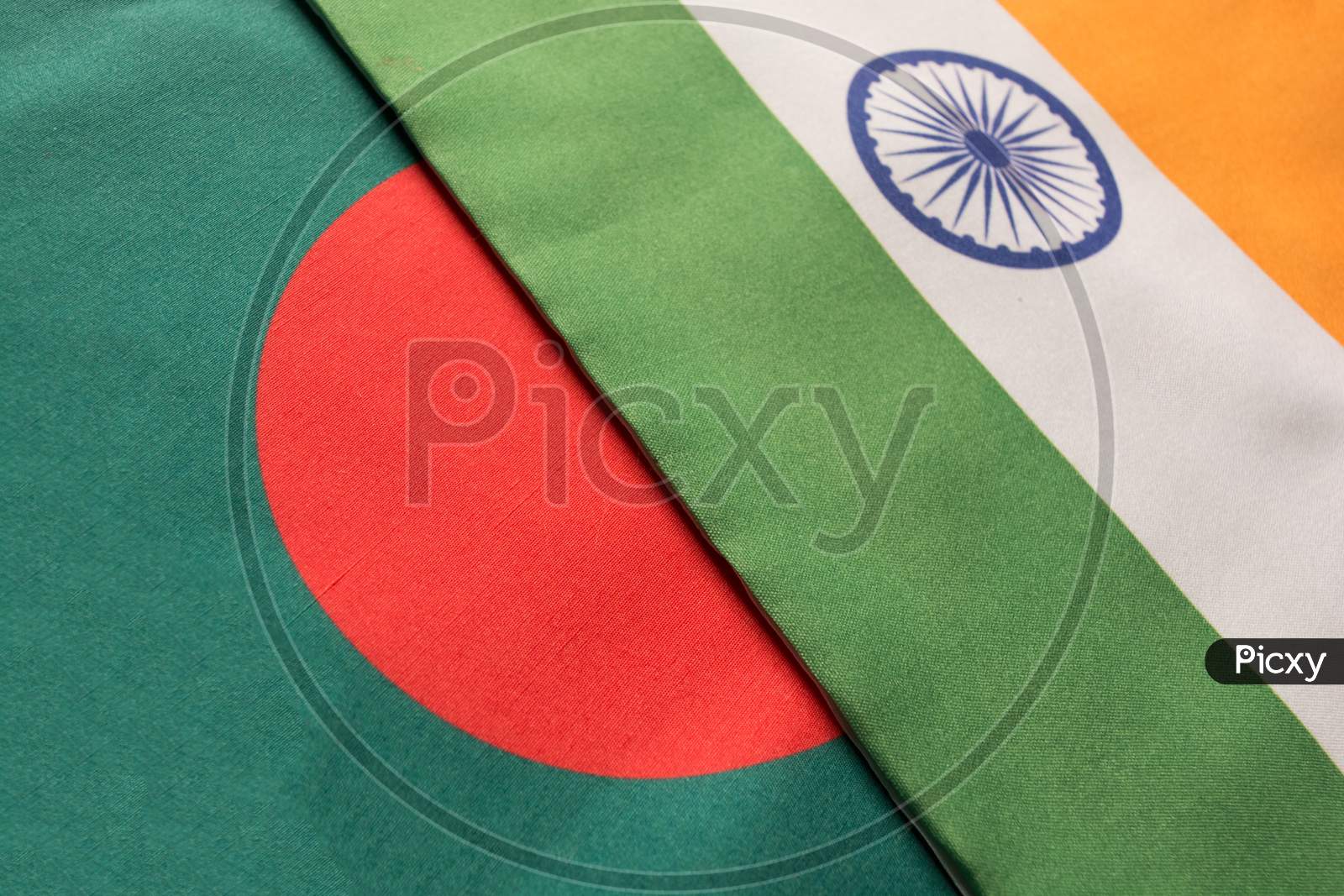 Bangladesh And Indian Flags Placed On Table