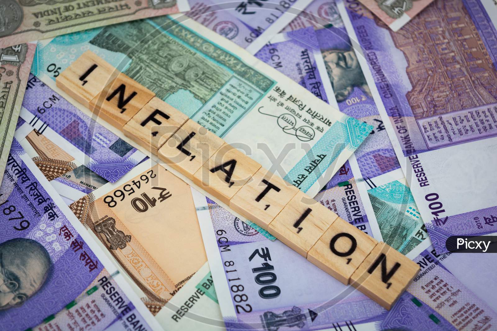 Concept Of Inflation Word On Indian Currency Notes.