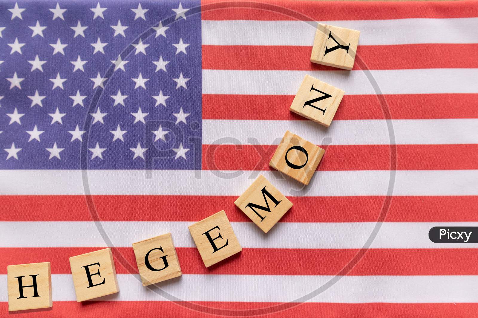 Concept Of Us Hegemony, Hegemony In Wooden Block Letters On Us Flag
