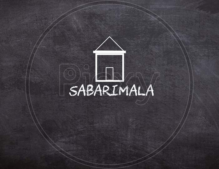 Sabarimala written on a Black Board