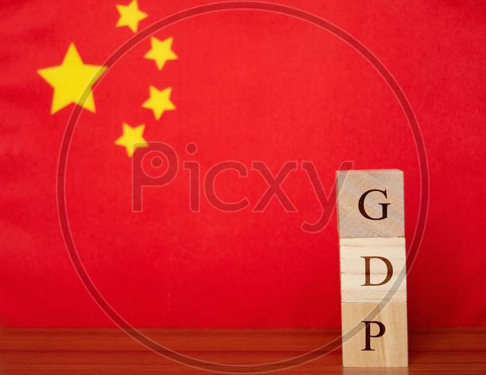 Concept Of Gross Domestic Product Or Gdp Of China In Wooden Letter Boxes.