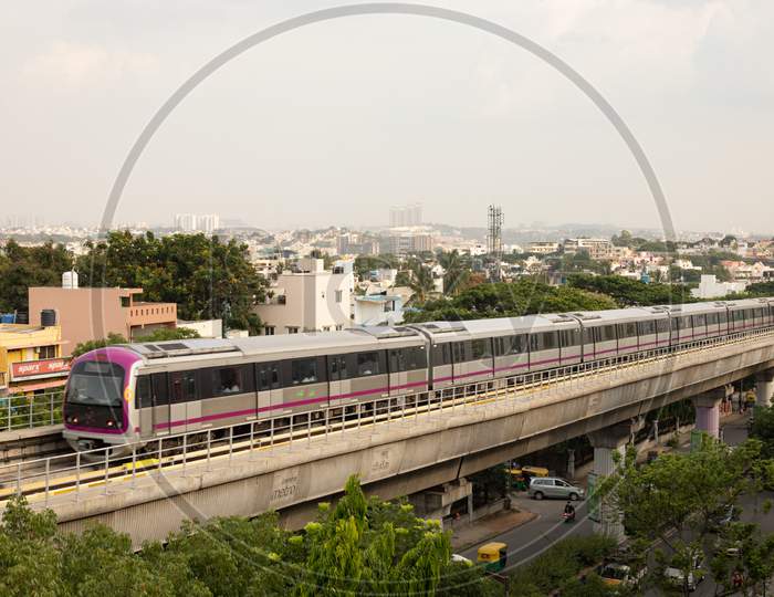 Aerial View Bengaluru Metro Moving On The Bridge Near Vijaya Nagara, Bengaluru , India