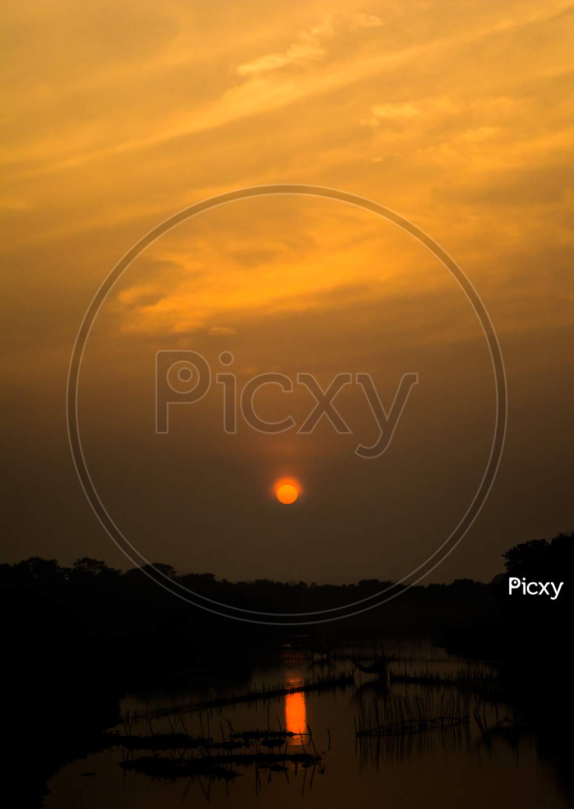 Sunset View with lake and river in the evening at Kaziranga Assam, India.