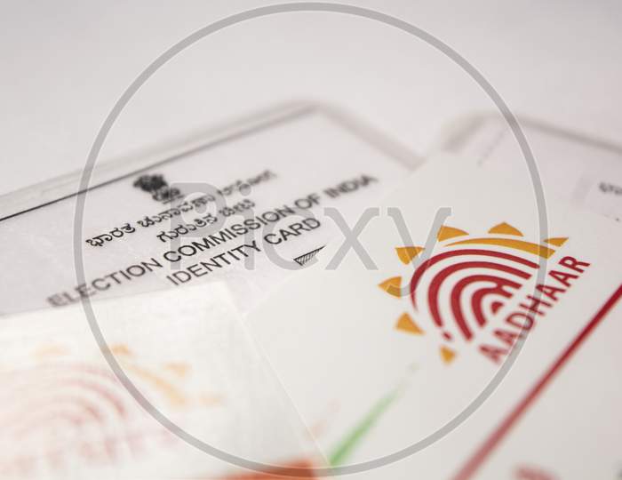 Close up shot of Aadhar and Election Commission of India Identity Card
