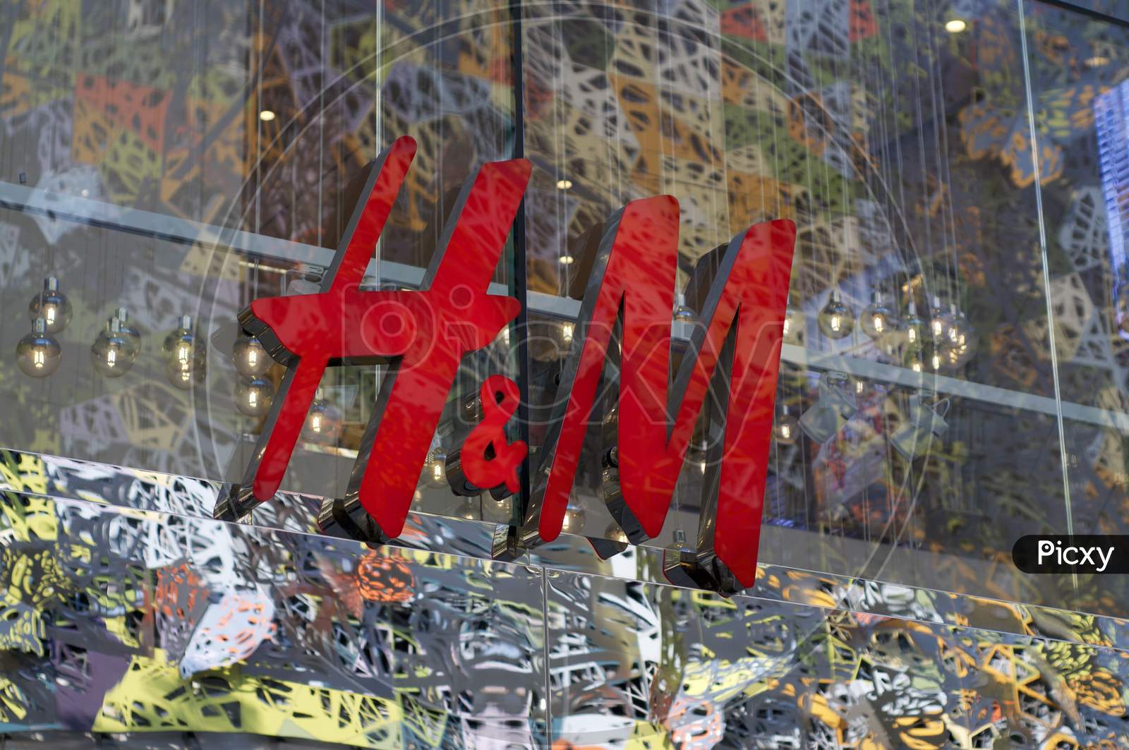 H&M Sign On A Glass Wall