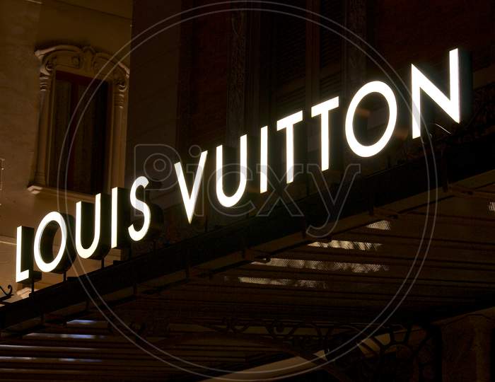 Illuminated Louis Vuitton Signage Over The Store In Lugano