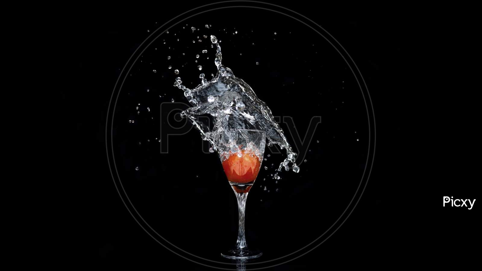 Beautiful Splash Of Liquid Into Wine Glass