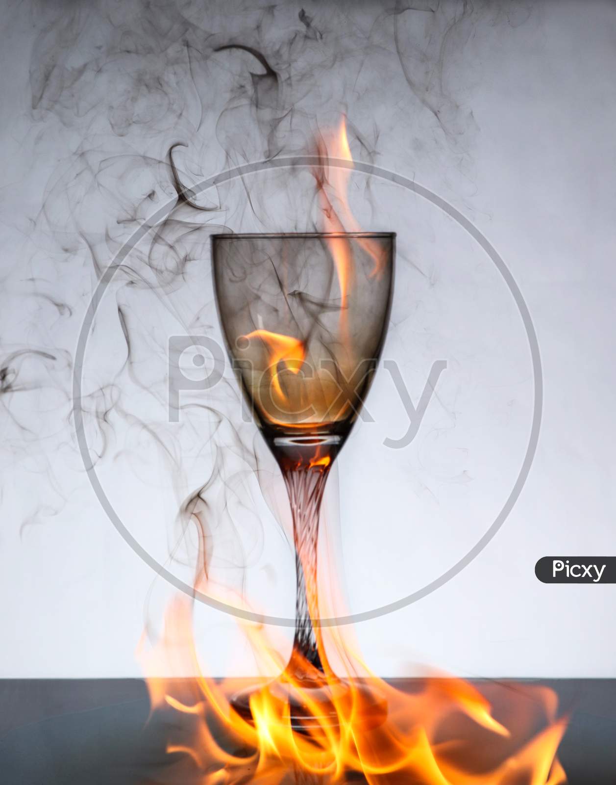 Wine Glass On Fire And Ashes