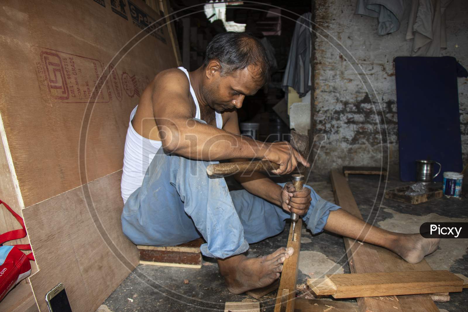 Indian man working in a workshop