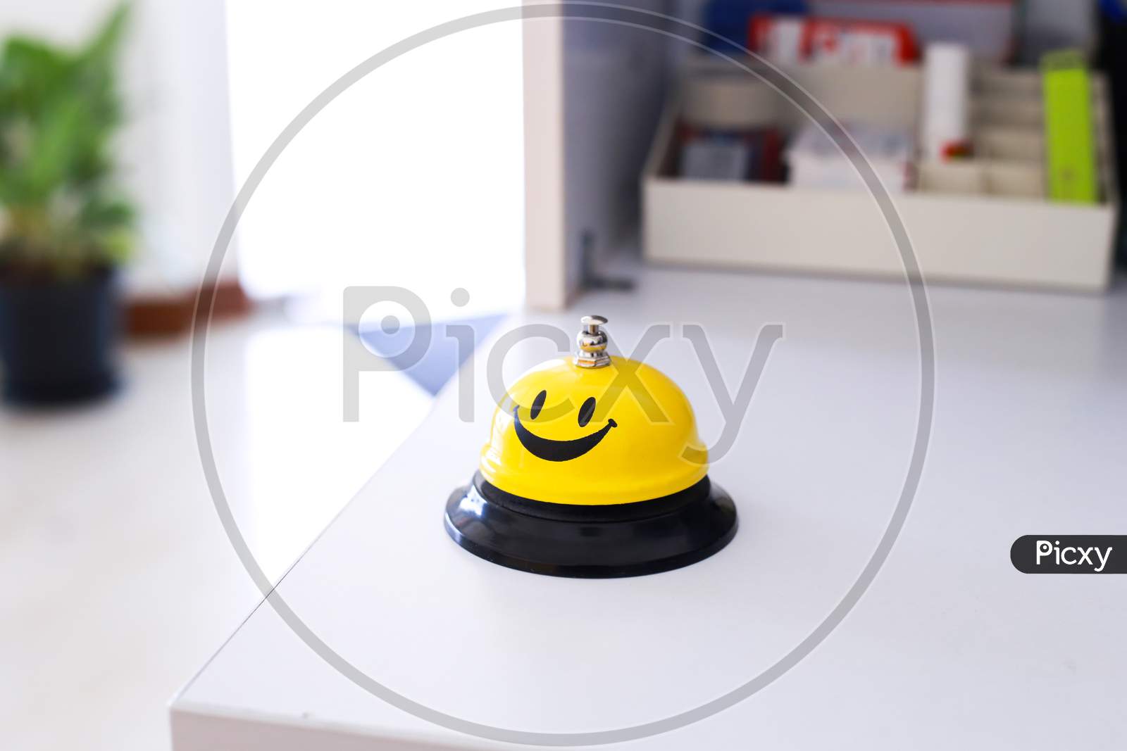 Creative Yellow Smiling Table Bell In Multiple Angle