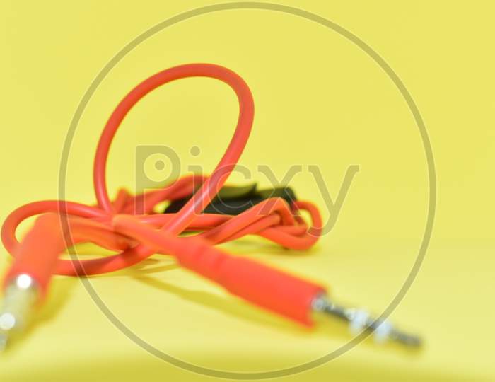 High-Quality Audio Cable For Display In Yellow Background.