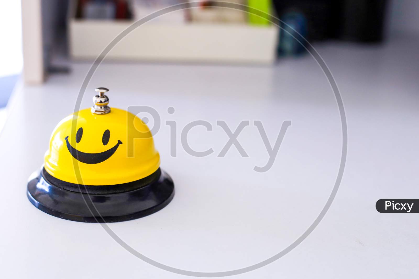 Creative Yellow Smiling Table Bell In Multiple Angle