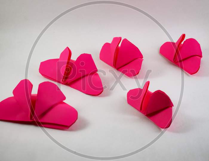 Paper Handmade Pink Butterflies On A White Background. – Delhi, India .
