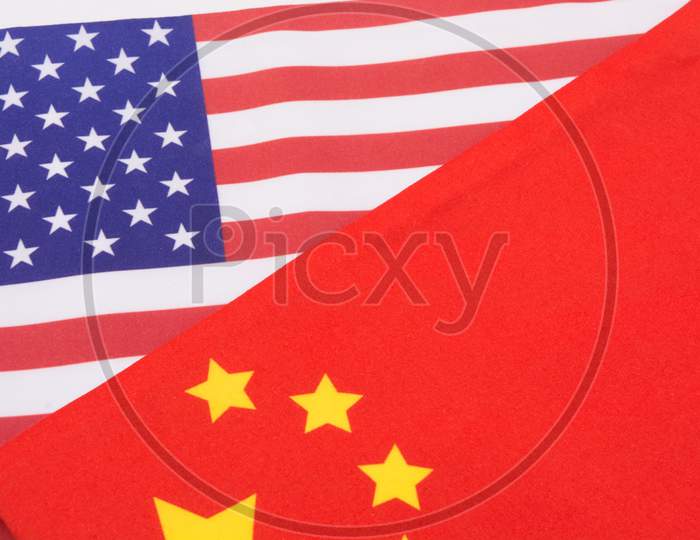 American And China Flag On Isolated Background.