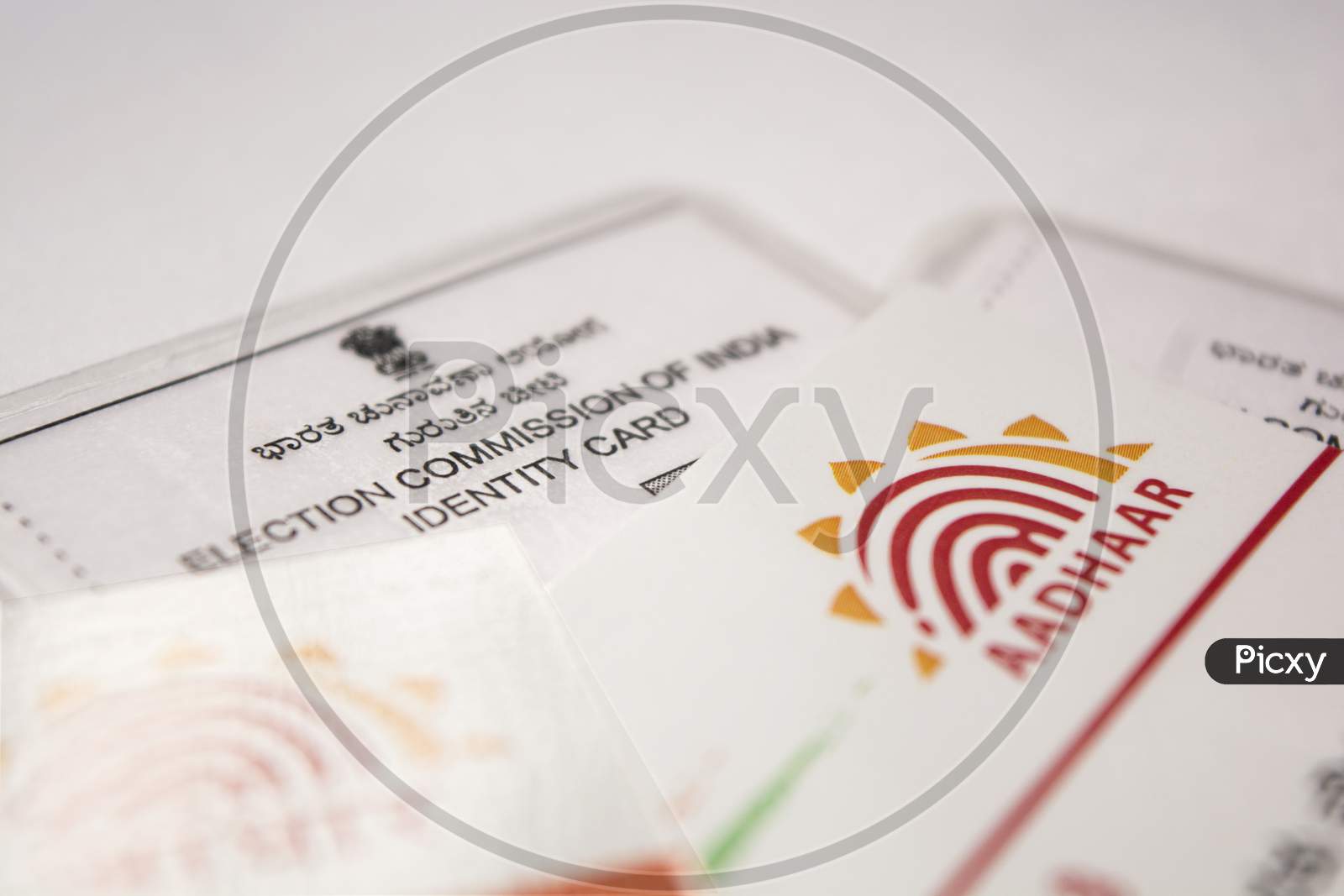 Close up shot of Aadhar and Election Commission of India Identity Card
