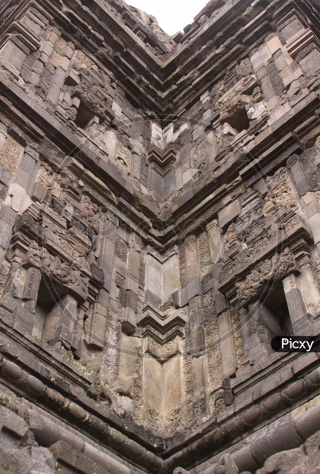Mirror-Like Corner Details Of Tower At Prambanan
