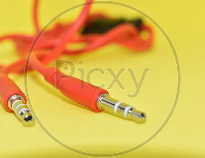 High-Quality Audio Cable For Display In Yellow Background.