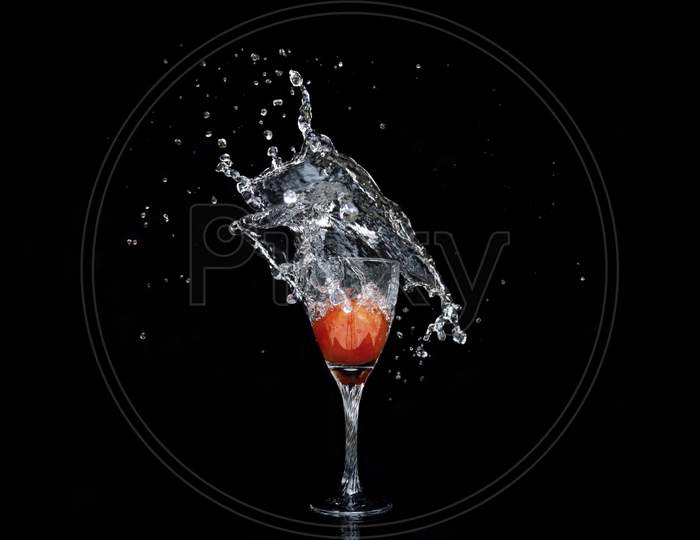 Beautiful Splash Of Liquid Into Wine Glass
