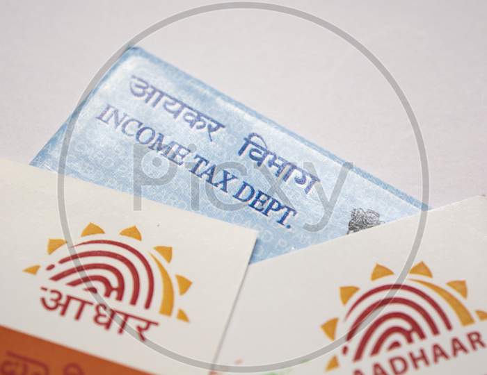 Close up shot of Aadhar Card and Pan Card