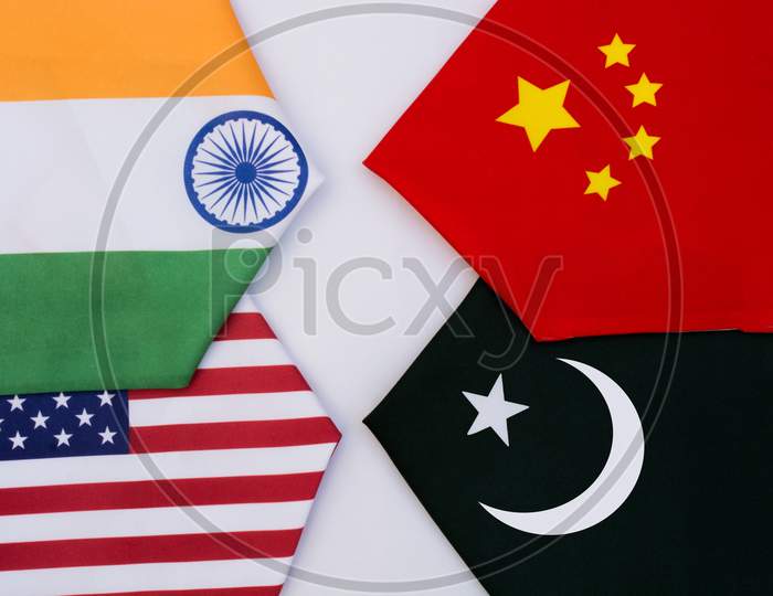 Direction Of Usa And India Flags Moving On One Direction And China, Pakistan Showing Opposite Direction On Isolated Background
