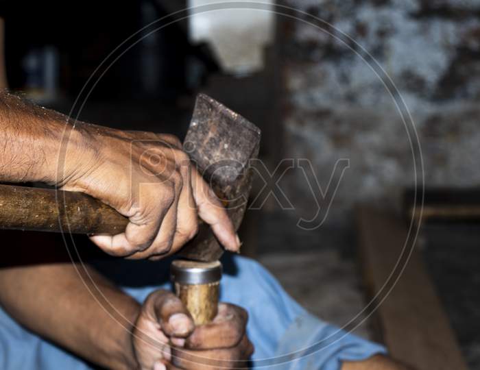 Indian man working in a carpentry workshop