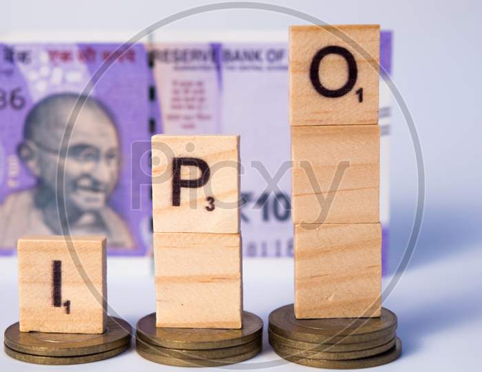 Initial Public Offering Or Ipo Concept With Indian Currency Notes On Isolated Background.