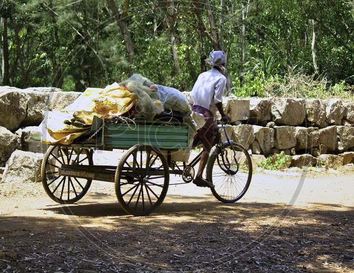 A Labor Worker Carrying Goods For Living In Rural Area Of India