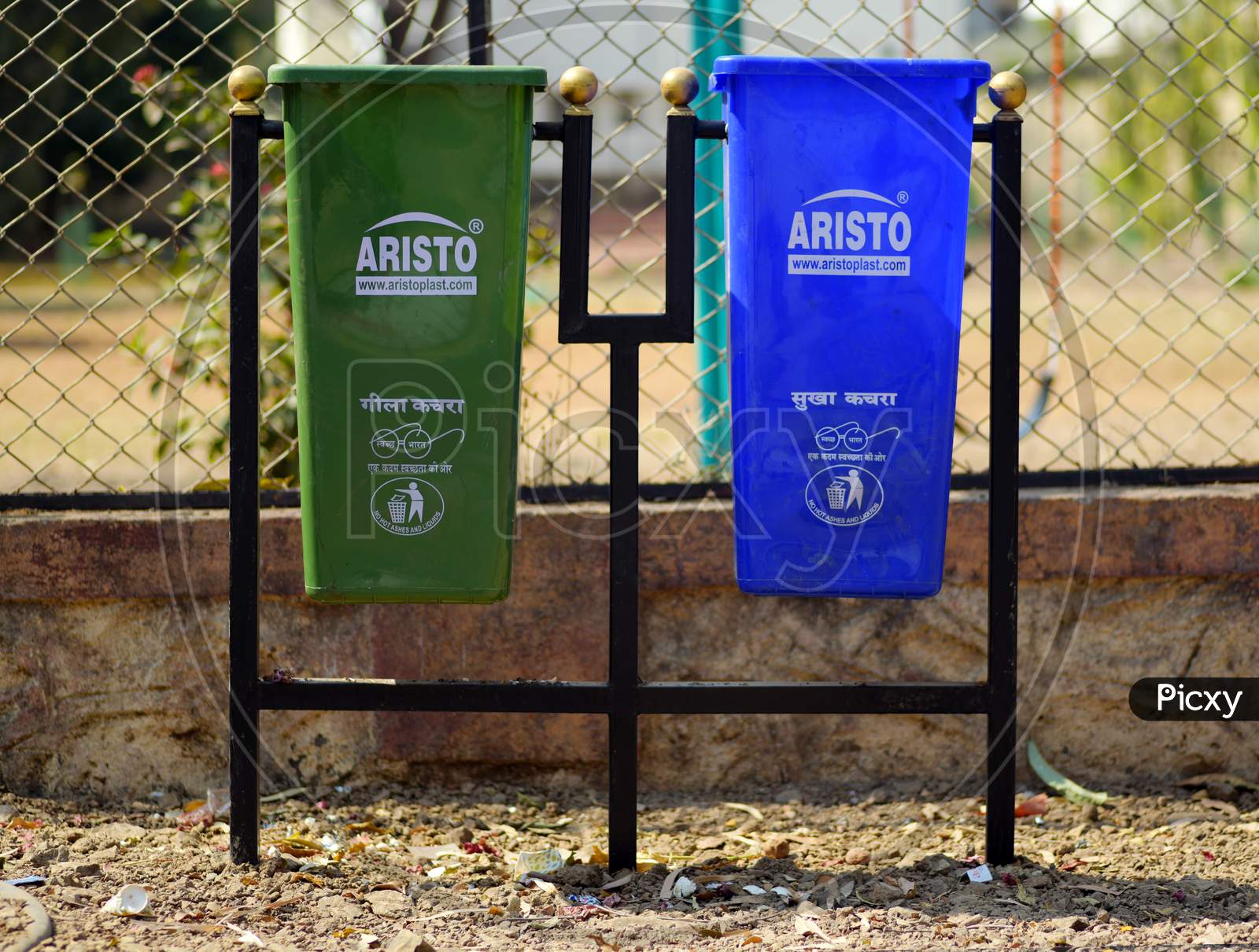 Garbage bins for dry and wet waste segregation