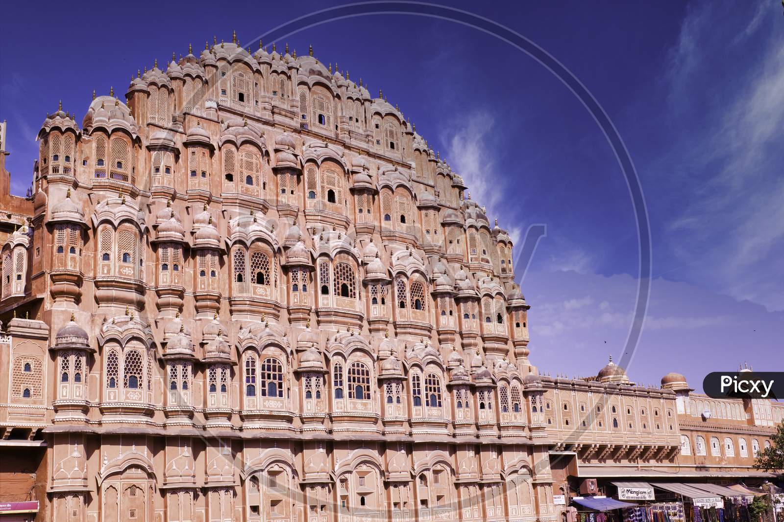 Rajasthan, India - October 07, 2012: Wide Angle Shot Of A Hawa Mahal Located In Pink City Jaipur Before Clear Blue Sky