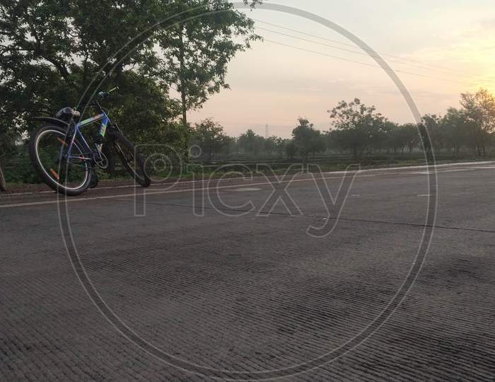 Bicycle View In Early Morning Sunrise In Spring Season