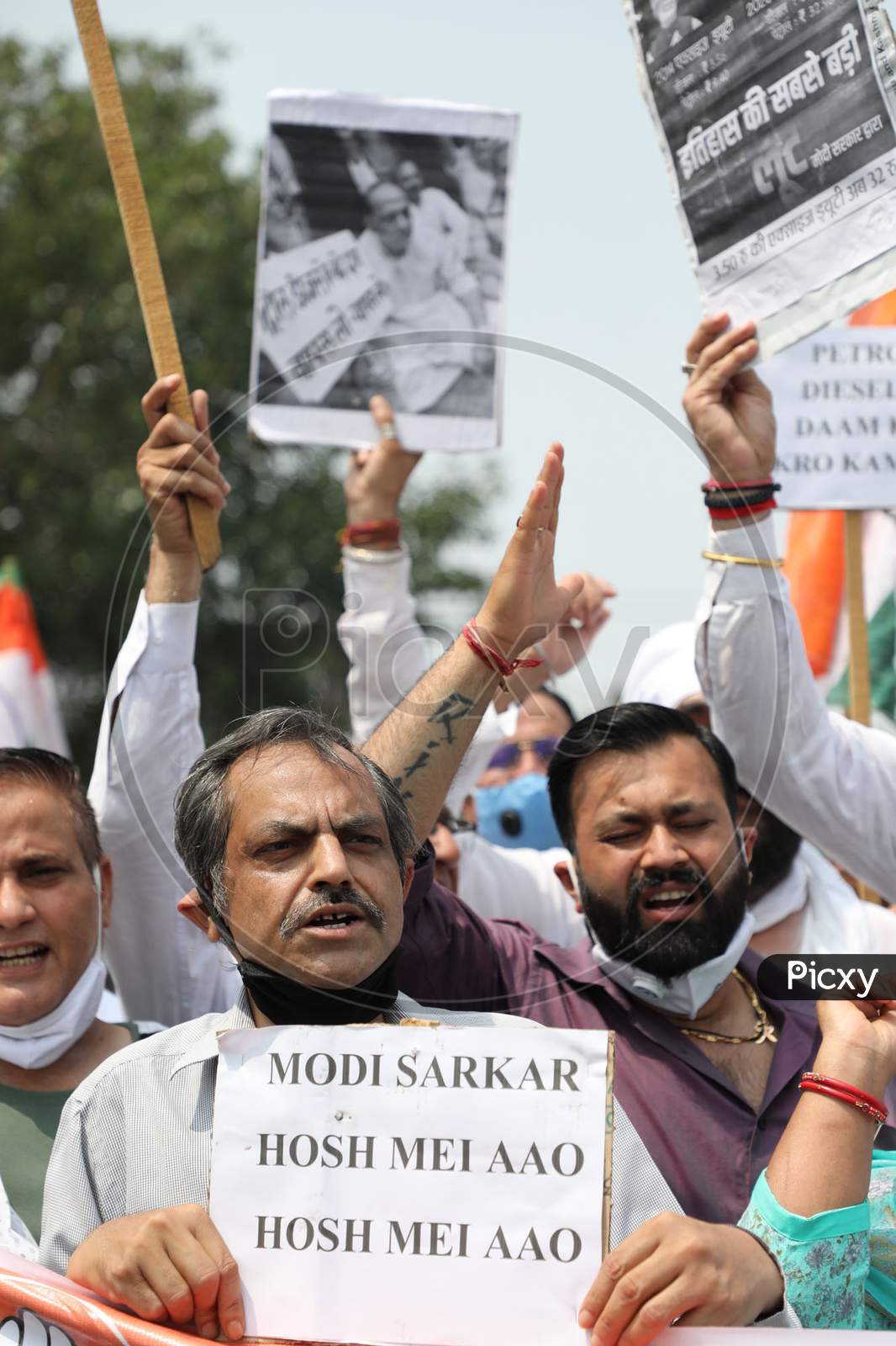 Congress Party workers who were moving towards the Divisional Commissioner Office protest against the hike in the prices of petrol and diesel, in Jammu