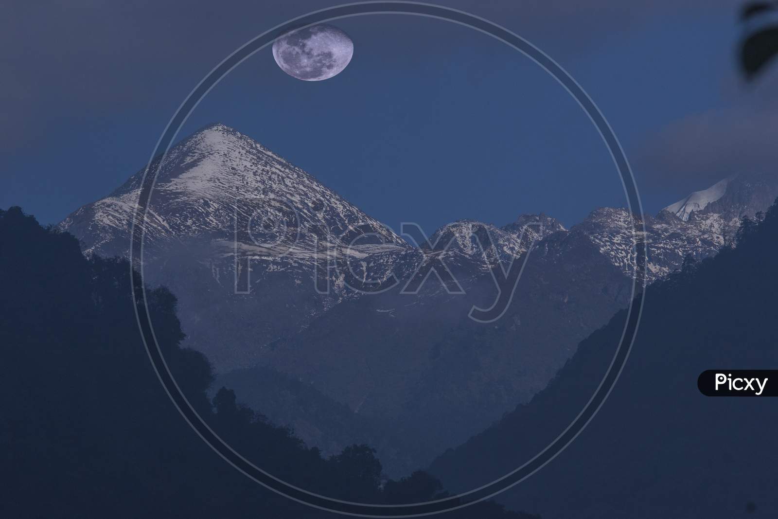 Mount Kanchenjunga At Night With Moon Eclipse