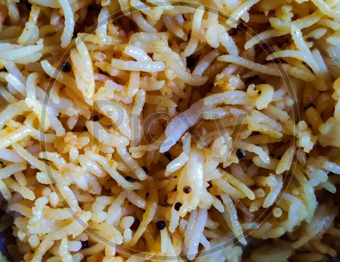 Fried rice made in black mustard seeds, a simple Indian dish.